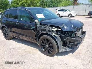 2021 Volkswagen Tiguan SE with VIN 3VV3B7AX1MM083860, listed as a IAAI auction lot 42661731 with 68,727 mi miles and . Bid and sale history available at DreamBid. Image 1.