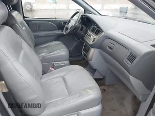 2001 Toyota Sienna LE with VIN 4T3ZF13CX1U400520, listed as a IAAI auction lot 41725348 with 258,267 mi miles. Bid and sale history available at carsss.com. Image 5.