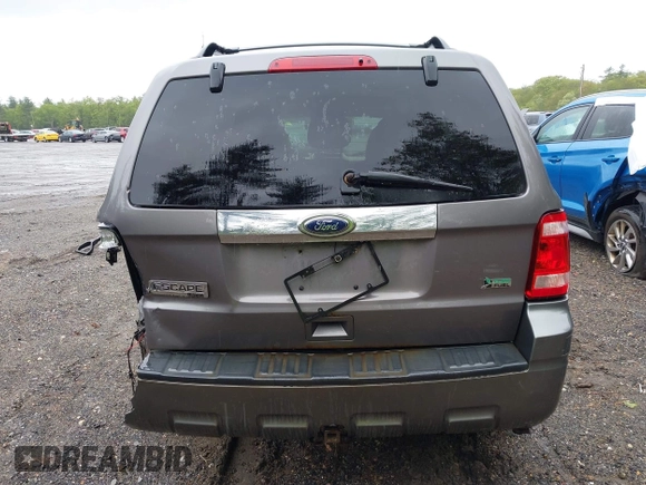 2010 Ford Escape Limited z VIN 1FMCU9EGXAKA70120, wystawiony jako IAAI lot #42330489 z przebiegiem 179 604 mil mil oraz . Historia ofert i sprzedaży dostępna na DreamBid. Obrazek 16.