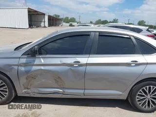 2021 Volkswagen Jetta S z VIN 3VWC57BU9MM015930, wystawiony jako IAAI lot #42020727 z przebiegiem 67 982 mil mil oraz . Historia ofert i sprzedaży dostępna na DreamBid. Obrazek 14.