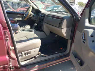 2003 Jeep Grand Cherokee Limited with VIN 1J4GW58S23C577383, listed as a IAAI auction lot 41957536 with 187,755 mi miles. Bid and sale history available at carsss.com. Image 5.