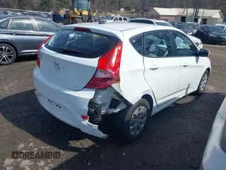 2016 Hyundai Accent SE with VIN KMHCT5AE0GU238781, listed as a IAAI auction lot 41805846 with 121,022 mi miles. Bid and sale history available at carsss.com. Image 4.