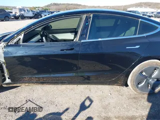 2020 Tesla Model 3 Standard Range Plus with VIN 5YJ3E1EA7LF802492, listed as a IAAI auction lot 40846048 with 36,488 mi miles and . Bid and sale history available at DreamBid. Image 15.