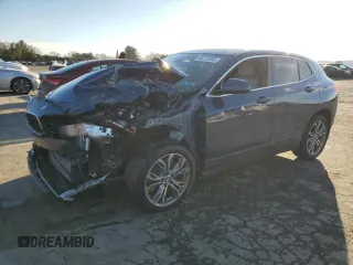 2022 BMW X2 xDrive28i with VIN WBXYJ1C04N5T58796, listed as a Copart auction lot 88723255 with 0 mi miles and Salvage Title. Bid and sale history available at carsss.com. Image 1.