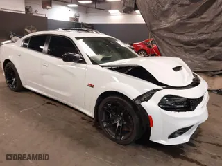 2023 Dodge Charger Scat Pack Widebody with VIN 2C3CDXGJ7PH556888, listed as a IAAI auction lot 40791470 with 11,887 mi miles. Bid and sale history available at carsss.com. Image 1.