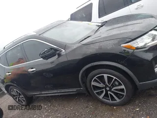 2018 Nissan Rogue SV with VIN JN8AT2MT6JW489275, listed as a IAAI auction lot 41969868 with 135,789 mi miles and . Bid and sale history available at DreamBid. Image 13.