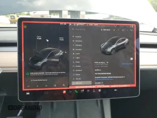 2024 Tesla Model Y Long Range z VIN 7SAYGDEE9RF186388, wystawiony jako Copart lot #58471595 z przebiegiem 23 185 mil mil oraz Szkoda całkowita • Salvage title. Historia ofert i sprzedaży dostępna na DreamBid. Obrazek 9.