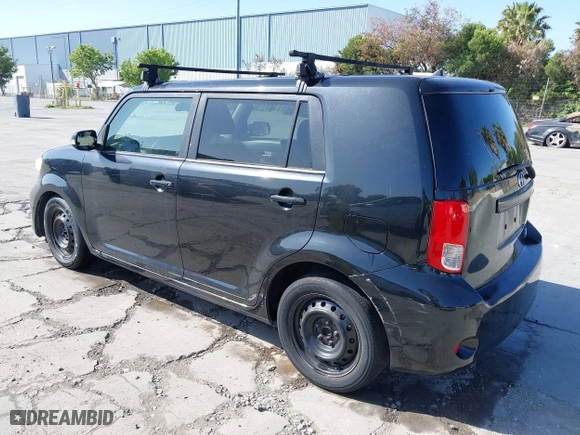 2012 Scion xB with VIN JTLZE4FE4C1143412, listed as a IAAI auction lot 42091929 with 213,501 mi miles. Bid and sale history available at carsss.com. Image 3.