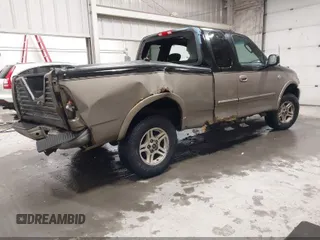 2003 Ford F-150 XL z VIN 1FTRX18L73NA93596, wystawiony jako IAAI lot #42069903 z przebiegiem 283 361 mil mil oraz . Historia ofert i sprzedaży dostępna na DreamBid. Obrazek 4.