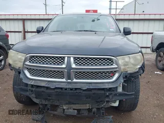 2013 Dodge Durango SXT z VIN 1C4RDHAG1DC692988, wystawiony jako IAAI lot #41916998 z przebiegiem 235 469 mil mil oraz . Historia ofert i sprzedaży dostępna na DreamBid. Obrazek 13.