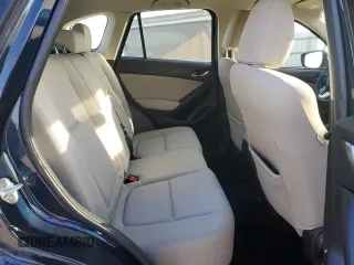 2015 Mazda CX-5 Sport z VIN JM3KE2BE6F0491107, wystawiony jako Copart lot #42462395 z przebiegiem 82 528 mil mil oraz Szkoda całkowita • Salvage title. Historia ofert i sprzedaży dostępna na DreamBid. Obrazek 12.