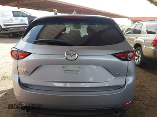 2017 Mazda CX-5 Grand Touring with VIN JM3KFADL3H0121772, listed as a IAAI auction lot 41935183 with 48,869 mi miles and . Bid and sale history available at carsss.com. Image 16.