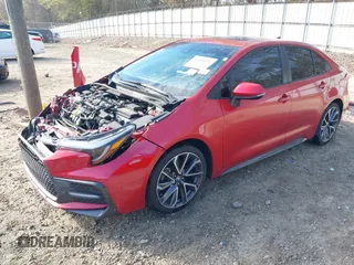 2021 Toyota Corolla SE with VIN 5YFP4MCE7MP061844, listed as a IAAI auction lot 41890136 with 66,040 mi miles. Bid and sale history available at carsss.com. Image 2.