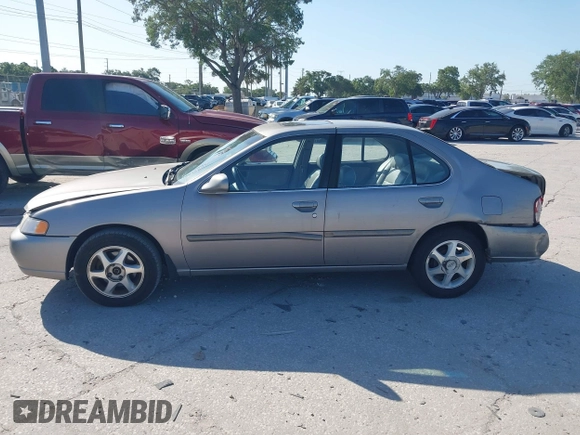 1999 Nissan Altima XE with VIN 1N4DL01D1XC255927, listed as a IAAI auction lot 42003101 with 154,000 mi miles. Bid and sale history available at carsss.com. Image 14.