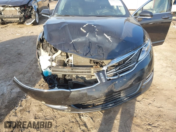 2015 Lincoln MKZ z VIN 3LN6L2J96FR619104, wystawiony jako IAAI lot #41794707 z przebiegiem 140 899 mil mil oraz . Historia ofert i sprzedaży dostępna na DreamBid. Obrazek 6.