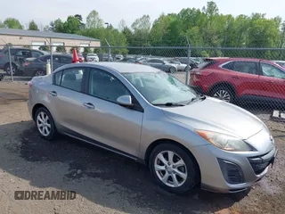 2011 Mazda Mazda3 i Touring with VIN JM1BL1VGXB1372499, listed as a IAAI auction lot 42112283 with 98,564 mi miles. Bid and sale history available at carsss.com. Image 1.
