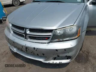 2014 Dodge Avenger SE with VIN 1C3CDZABXEN202963, listed as a IAAI auction lot 42479888 with 178,718 mi miles and . Bid and sale history available at DreamBid. Image 12.