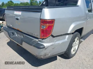 2013 Honda Ridgeline RTL with VIN 5FPYK1F51DB007236, listed as a IAAI auction lot 42762126 with 201,758 mi miles and . Bid and sale history available at DreamBid. Image 6.