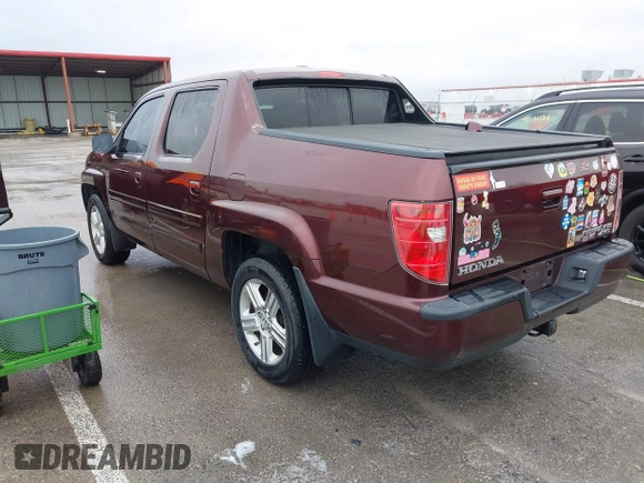 2009 Honda Ridgeline RTL with VIN 5FPYK16529B100032, listed as a IAAI auction lot 41206781 with 130,694 mi miles and . Bid and sale history available at DreamBid. Image 3.