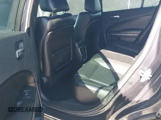 2019 Dodge Charger SXT with VIN 2C3CDXBG2KH695976, listed as a IAAI auction lot 41859947 with 161,093 mi miles and . Bid and sale history available at DreamBid. Image 8.