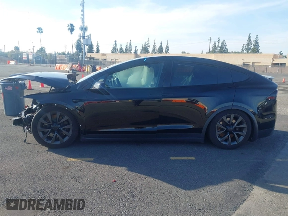 2023 Tesla Model X with VIN 7SAXCDE59PF430836, listed as a IAAI auction lot 41545267 with Not Provided miles and . Bid and sale history available at DreamBid. Image 13.