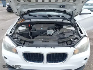 2015 BMW X1 sDrive28i with VIN WBAVM1C50FV314957, listed as a IAAI auction lot 41816402 with 148,410 mi miles. Bid and sale history available at carsss.com. Image 10.