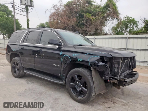 2020 Chevrolet Tahoe LT with VIN 1GNSCBKC5LR203301, listed as a Copart auction lot 57071315 with 106,376 mi miles and Salvage title. Bid and sale history available at DreamBid. Image 4.