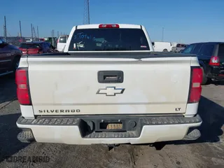 2016 Chevrolet Silverado 1500 LT with VIN 3GCUKREC6GG306239, listed as a IAAI auction lot 41380251 with 128,042 mi miles. Bid and sale history available at carsss.com. Image 17.
