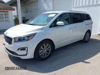 2021 Kia Sedona LX with VIN KNDMB5C12M6661917, listed as a IAAI auction lot 42129682 with 80,321 mi miles and . Bid and sale history available at carsss.com. Image 17.