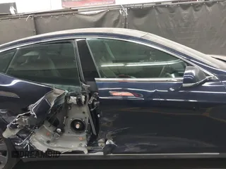 2014 Tesla Model S 60 with VIN 5YJSA1H11EFP56406, listed as a IAAI auction lot 42065157 with Not Provided miles and . Bid and sale history available at DreamBid. Image 13.