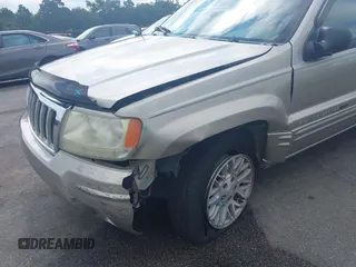 2004 Jeep Grand Cherokee Limited with VIN 1J4GX58SX4C255363, listed as a IAAI auction lot 42619798 with 239,475 mi miles and . Bid and sale history available at DreamBid. Image 6.