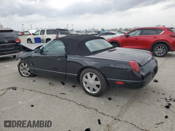 2003 Ford Thunderbird Deluxe z VIN 1FAHP60AX3Y101570, wystawiony jako Copart lot #51546865 z przebiegiem 108 736 mil mil oraz Szkoda całkowita • Salvage title. Historia ofert i sprzedaży dostępna na DreamBid. Obrazek 2.