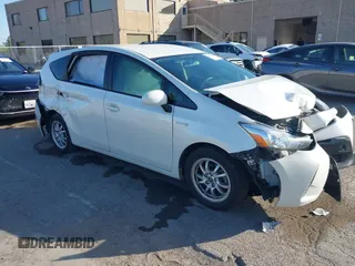 2017 Toyota Prius v Two with VIN JTDZN3EU9HJ066736, listed as a IAAI auction lot 42025100 with 89,082 mi miles. Bid and sale history available at carsss.com. Image 1.