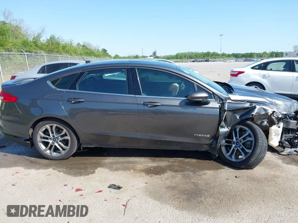 2017 Ford Fusion Hybrid SE with VIN 3FA6P0LU0HR195992, listed as a IAAI auction lot 42007452 with 78,578 mi miles and . Bid and sale history available at DreamBid. Image 13.