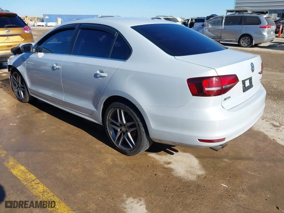 2017 Volkswagen Jetta 1.4T S with VIN 3VW167AJ0HM405252, listed as a IAAI auction lot 41200004 with 82,015 mi miles. Bid and sale history available at carsss.com. Image 3.