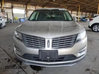 2015 Lincoln MKC z VIN 5LMCJ2A93FUJ05404, wystawiony jako Copart lot #41775985 z przebiegiem 141 841 mil mil oraz Szkody całkowita. Historia ofert i sprzedaży dostępna na DreamBid. Obrazek 5.