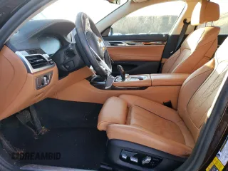 2020 BMW 7 Series with VIN WBA7W4C06LBM70555, listed as a Copart auction lot 52126455 with 37,375 mi miles and Salvage title. Bid and sale history available at DreamBid. Image 7.