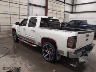 2009 Chevrolet Silverado 1500 LTZ with VIN 3GCEK33M39G177554, listed as a IAAI auction lot 41282566 with 142,356 mi miles. Bid and sale history available at carsss.com. Image 3.