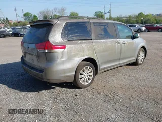 2011 Toyota Sienna LE with VIN 5TDJK3DC9BS012944, listed as a IAAI auction lot 42106998 with 108,700 mi miles. Bid and sale history available at carsss.com. Image 4.