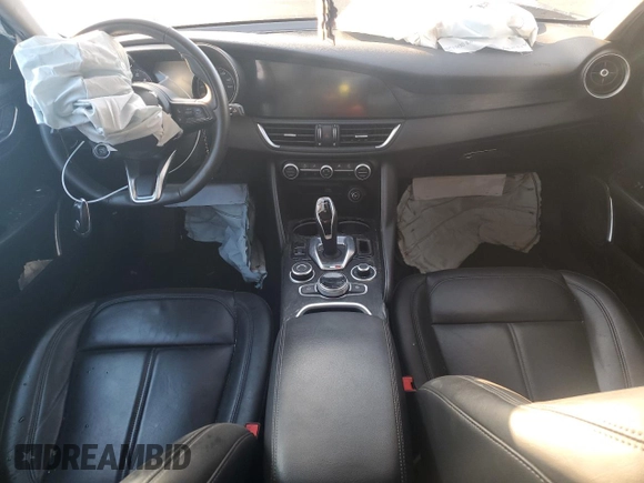 2020 Alfa Romeo Giulia z VIN ZARFANAN2L7626987, wystawiony jako Copart lot #74959044 z przebiegiem 33 486 mil mil oraz Szkoda całkowita • Salvage title. Historia ofert i sprzedaży dostępna na DreamBid. Obrazek 8.