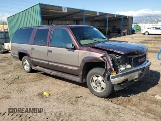 1997 GMC Suburban with VIN 3GKFK16R4VG518331, listed as a Copart auction lot 56241425 with 265,201 mi miles and Non repairable. Bid and sale history available at DreamBid. Image 4.