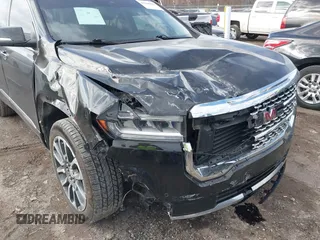 2022 GMC Acadia Denali with VIN 1GKKNPLSXNZ148311, listed as a IAAI auction lot 41660883 with 123,974 mi miles. Bid and sale history available at carsss.com. Image 6.