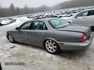 2004 Jaguar XJ with VIN SAJWA71C84SG31392, listed as a Copart auction lot 45021135 with 141,849 mi miles and Non Repairable. Bid and sale history available at carsss.com. Image 2.