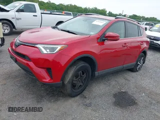 2017 Toyota RAV4 LE with VIN JTMBFREV8HJ161427, listed as a IAAI auction lot 42333851 with 121,161 mi miles and . Bid and sale history available at DreamBid. Image 2.
