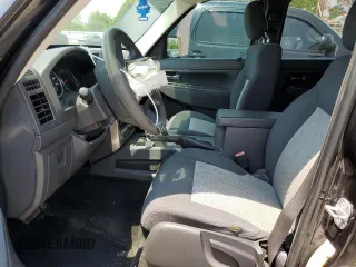 2010 Jeep Liberty Sport with VIN 1J4PN2GKXAW172869, listed as a Copart auction lot 60311115 with 137,965 mi miles and Salvage title. Bid and sale history available at DreamBid. Image 7.