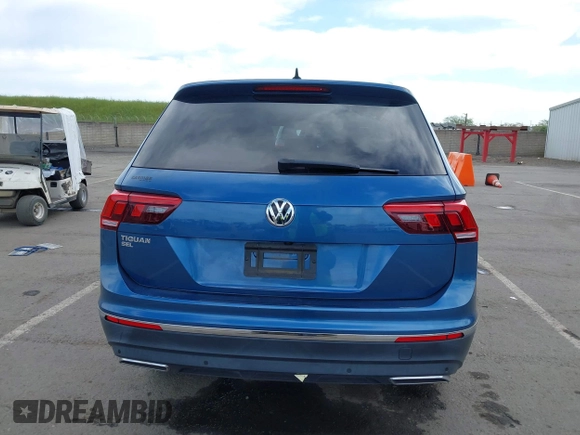 2019 Volkswagen Tiguan SE with VIN 3VV3B7AX2KM064568, listed as a IAAI auction lot 42008754 with 53,132 mi miles and . Bid and sale history available at DreamBid. Image 16.