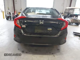 2016 Honda Civic Sedan LX with VIN 19XFC2F59GE017820, listed as a IAAI auction lot 41406871 with 126,376 mi miles. Bid and sale history available at carsss.com. Image 16.