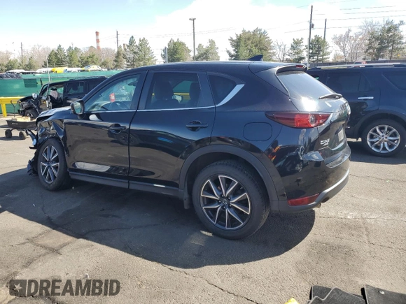 2018 Mazda CX-5 Touring with VIN JM3KFBCM4J0466234, listed as a Copart auction lot 51617095 with 58,200 mi miles and Salvage Title. Bid and sale history available at carsss.com. Image 2.