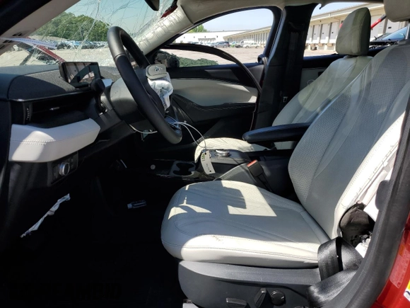2021 Ford Mustang Mach-E Premium z VIN 3FMTK3SUXMMA10218, wystawiony jako Copart lot #56288255 z przebiegiem 63 334 mil mil oraz Szkoda całkowita • Salvage title. Historia ofert i sprzedaży dostępna na DreamBid. Obrazek 7.