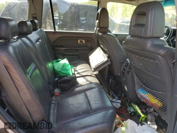 2003 Honda Pilot EX z VIN 2HKYF18633H602527, wystawiony jako Copart lot #53622465 z przebiegiem 254 281 mil mil oraz Szkoda całkowita • Salvage title. Historia ofert i sprzedaży dostępna na DreamBid. Obrazek 11.